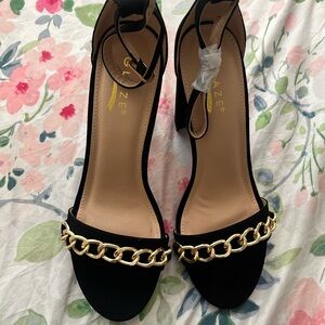 gaze Black Ankle-Strap Heels with Gold Chain